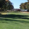 A view from fairway #10 to tee with clubhouse in background at Saluda Valley Country Club