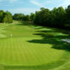 A view of a hole with sand trap on the right side at Blackmoor Golf Club