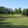 A view of green protected by bunkers at River Falls Plantation