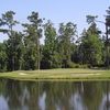 A view of green #18 surrounded by water at Shannon Greens Golf Club